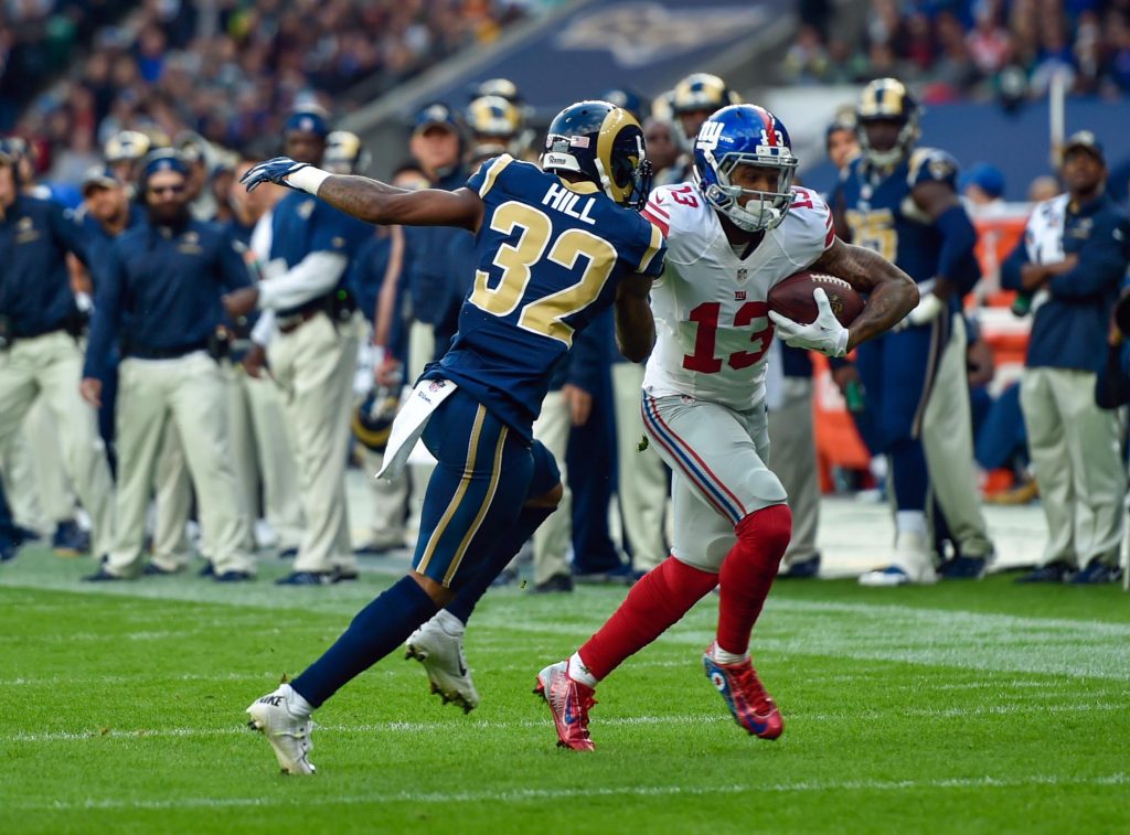 Oct 23, 2016; London, ENG; Wide receiver Odell Beckham (13) of the New York Giants runs with the ball against the Los Angeles Rams during the third quarter of the game between the Los Angeles Rams and the New York Giants at Twickenham Stadium. Mandatory Credit: Steve Flynn-USA TODAY Sports
