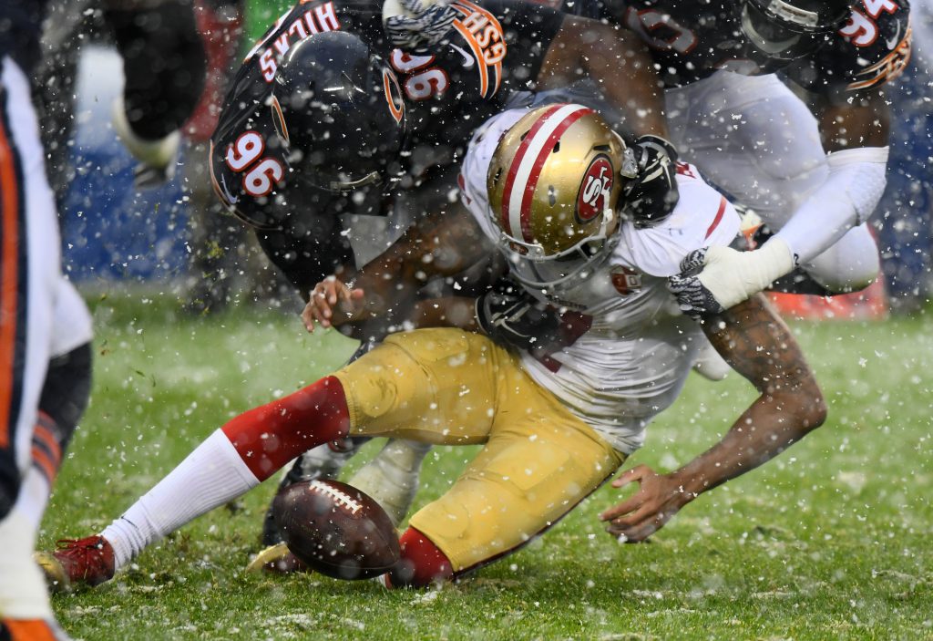 Dec 4, 2016; Chicago, IL, USA; Chicago Bears defensive end Akiem Hicks (96) knocks the ball away from San Francisco 49ers quarterback Colin Kaepernick (7) during the second half at Soldier Field. Mandatory Credit: Mike DiNovo-USA TODAY Sports