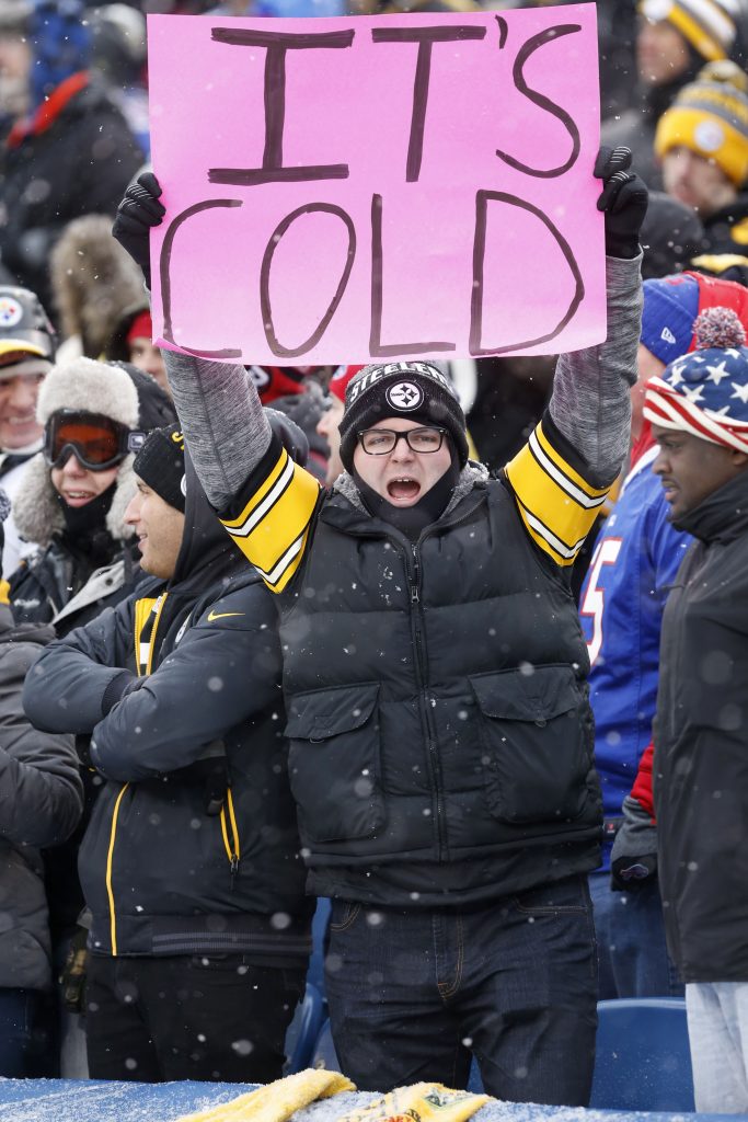 Dec 11, 2016; Orchard Park, NY, USA; A Pittsburgh fan holds up a sign during a game between the Buffalo Bills and the Pittsburgh Steelers at New Era Field. Pittsburgh beat Buffalo 27-20. Mandatory Credit: Timothy T. Ludwig-USA TODAY Sports