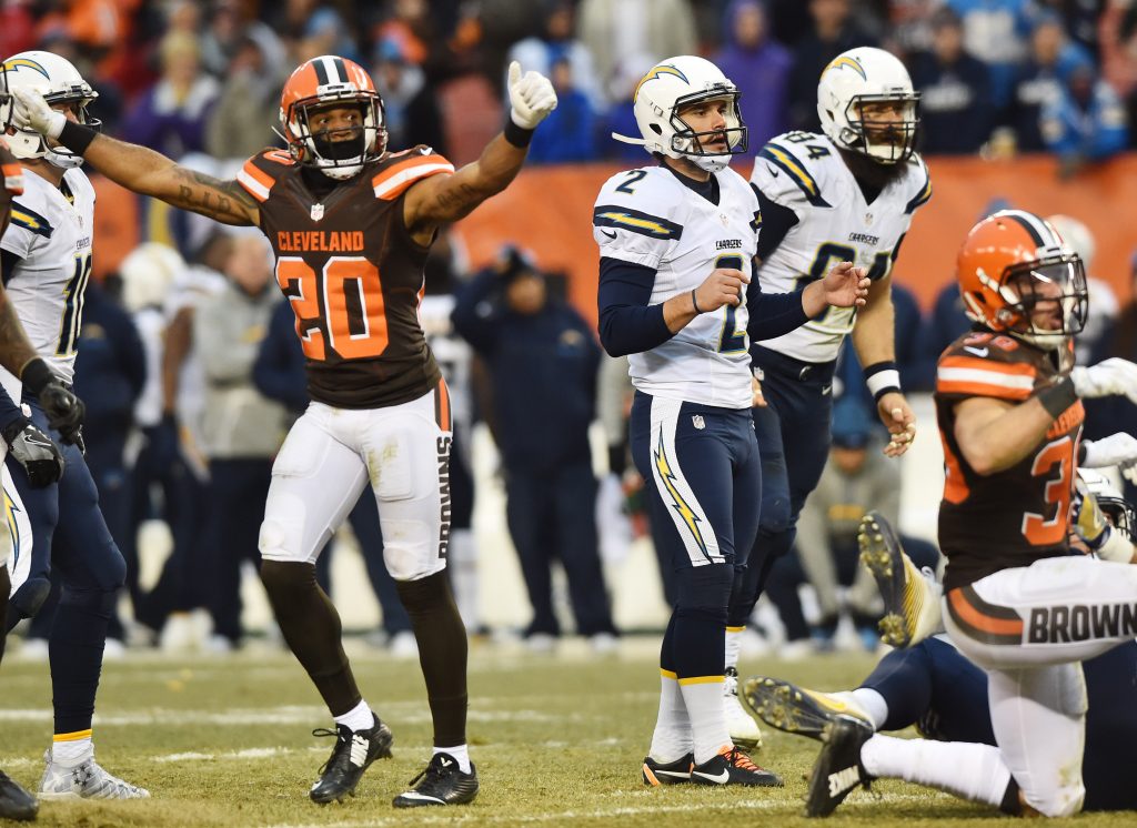 Dec 24, 2016; Cleveland, OH, USA; San Diego Chargers kicker Josh Lambo (2) and Cleveland Browns strong safety Briean Boddy-Calhoun (20) react after a field goal was blocked during the fourth quarter at FirstEnergy Stadium. The Browns won 20-17. Mandatory Credit: Ken Blaze-USA TODAY Sports
