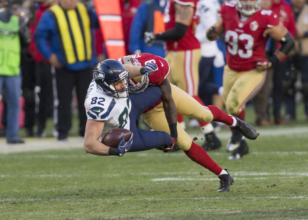 Jan 1, 2017; Santa Clara, CA, USA; Seattle Seahawks tight end Luke Willson (82) is tackled by San Francisco 49ers free safety Jaquiski Tartt (29) during the fourth quarter at Levis Stadium Seahawks defeated the 49ers 25-23. Mandatory Credit: Neville E. Guard-USA TODAY Sports