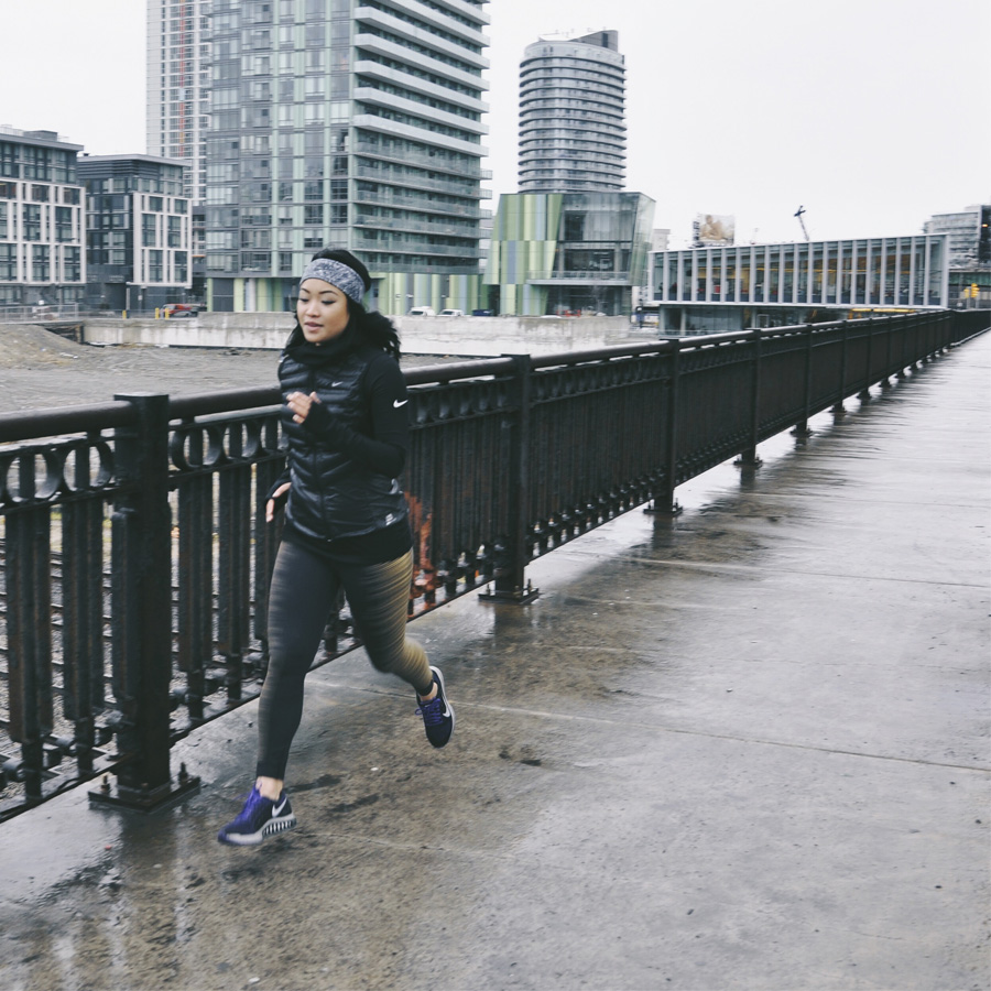 Anna Bediones @atothebed in Nike Aeroloft 800 Vest, Nike Printed Reflective Tights, Nike Zoom Structure 18 Flash Running Shoes