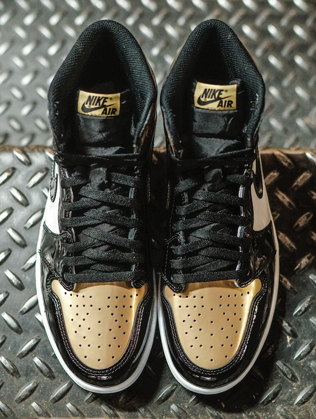 black and gold jordan 1 finish line