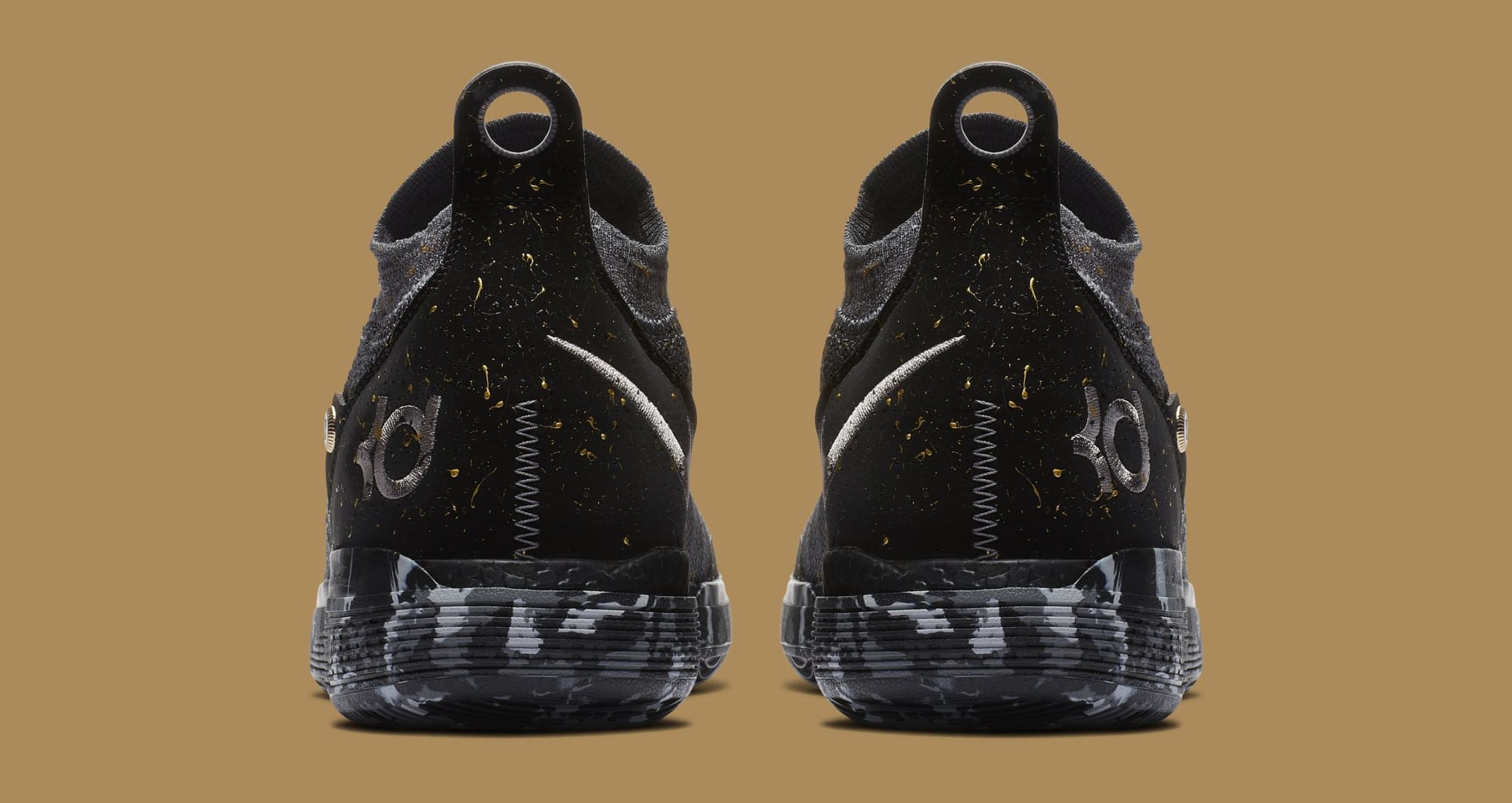 zoom kd 11 gold splatter