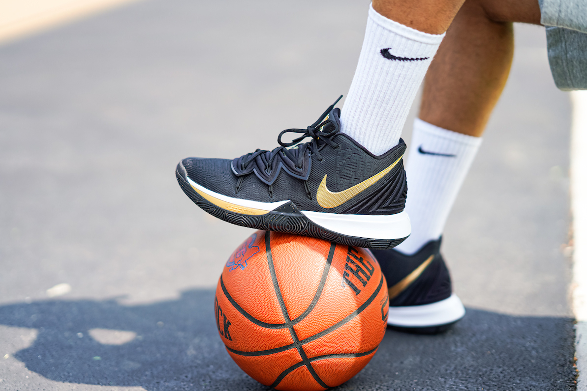 kyrie irving shoes black and gold