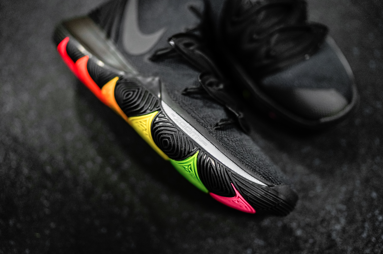 black nikes with rainbow bottom