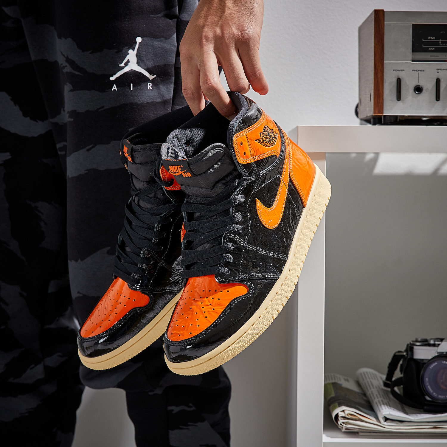 jordan retro 1 orange and black grade school