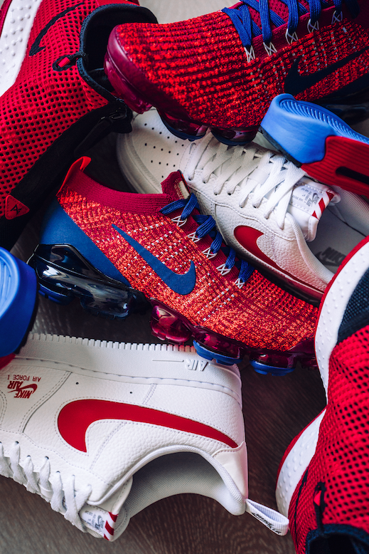 nike red blue and white shoes